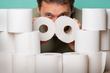 A greedy and thrifty toilet paper lover watches the approach of the apocalypse.