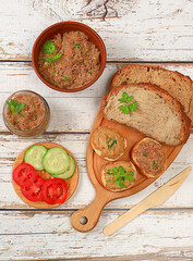 Homemade sandwiches with chicken pate, tomatoes, herbs and cucumbers, the concept of a healthy...