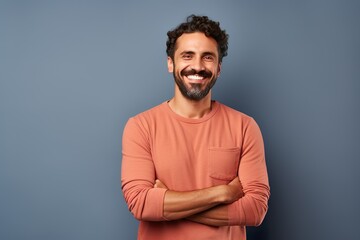 Fototapeta premium Happy Smiling Man: Confident Businessman Standing with Crossed Arms, Beauty, Joy, and Authenticity
