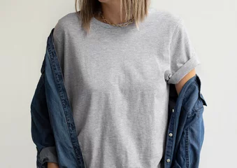 Gardinen Gray tshirt mockup. Girl grey t shirt template. Woman wearing athletic heather gray t shirt for your design © Gravity Digital