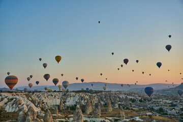 Hot air ballons flying above Goreme, Cappadocia, Turkey