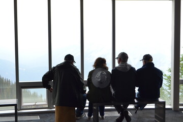 people in airporton, people the observation deck in the mountains
