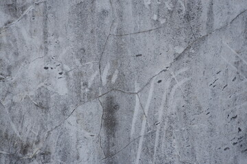 wall background with grunge texture and cracks in black, white and gray