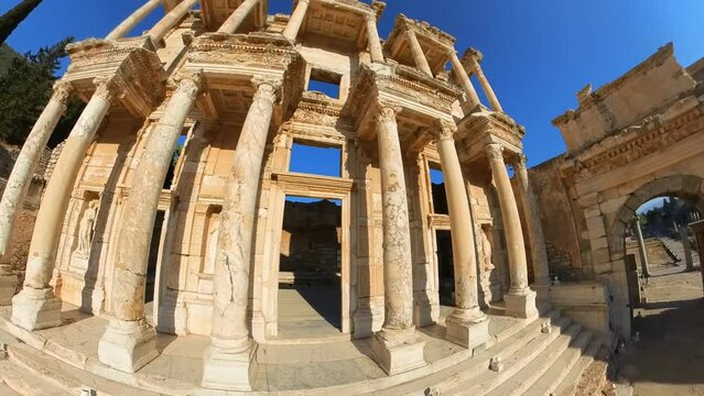 Library of Celsus and gate of Augustus in Ephesus archeological site in Turkey. Today, the Library of Celsus continues to inspire awe, drawing travelers and history enthusiasts worldwide.