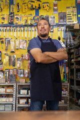 Adult  entrepreneur man with apron in her business,