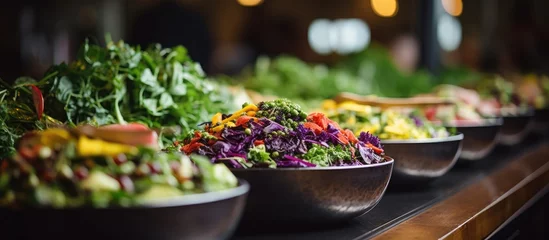 Foto op Canvas Fresh salad bar buffet at a restaurant offering healthy vegetarian food for lunch or dinner Catering and banquet services available © TheWaterMeloonProjec