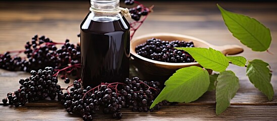 Elderberry elements on wooden background alternative medicine