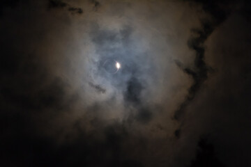 Obraz na płótnie Canvas Diamond Ring Total Solar Eclipse through clouds