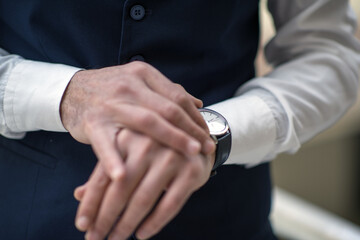 Business person talking on the phone, having a job interview, doing analysis with a tablet, and doing a job evaluation with a laptop.