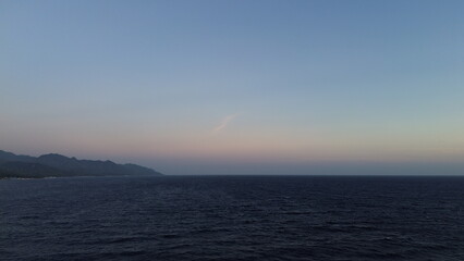 aerial view of sunset on the ocean
