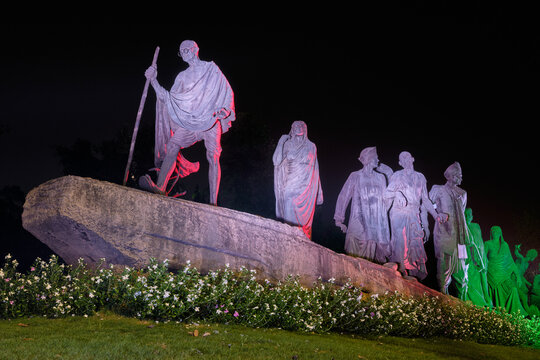 Dandi March Statue illuminated at night, commemorating the Salt March of 1930 in New Delhi, India