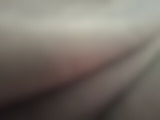 Abstract blur background image of black color gradient used as an illustration. Designing posters or advertisements.