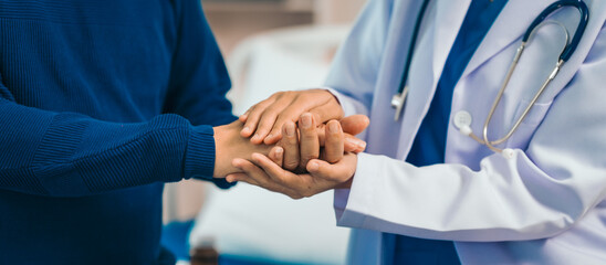 Elderly man engages in thoughtful discussion with compassionate asian people female doctor,...