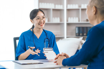 Cost of medical care, calculator, Asian people experienced female doctor giving advice to elderly male patient cancer and x-ray results and treatment options, Cancer Consultation