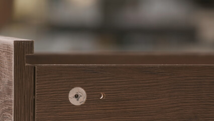 Painstaking work. Creative. Strong strong male people who assemble furniture in parts and special details.