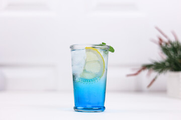 Ocean Blue Cocktail with Mint and Lemon Slice