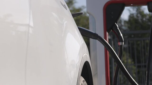 Charging electric vehicle at the supercharger station
