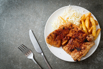 grilled spicy barbecue pork steak with french fries