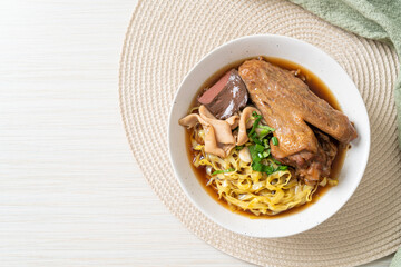 egg noodles with stewed and braised duck in brown soup