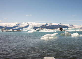 kayaking in Iceland next to an iceberg
