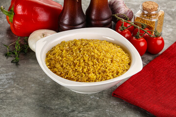 Dry wheat bulgur cereal heap