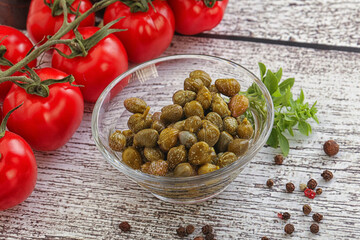 Marinated green capers in the bowl
