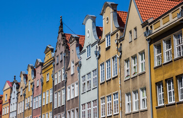 Facades of historic houses in Swietego Ducha street of Gdansk, Poland