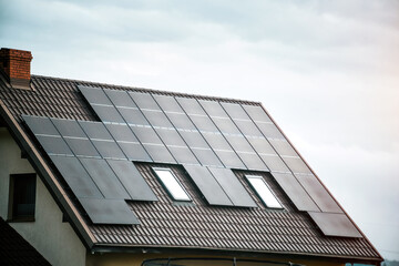 Solar Panels Powering a Sustainable Future. Modern Home with Photovoltaic Panels.
