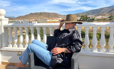 Portrait of young woman with hat