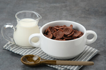 Bowl of cereal chocolate flavor, sweet crunchy 
