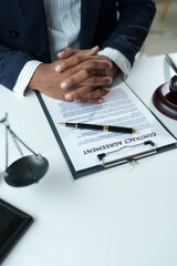 Attorney reading law code, studying constitution to protect human rights closeup, Male lawyer or judge working with Law books, gavel