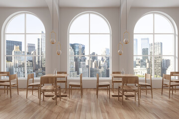 White restaurant interior with arched windows