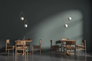Rolgordijnen Green restaurant interior with wooden tables © ImageFlow