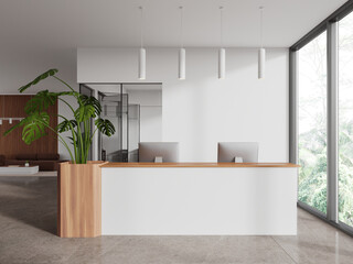 White office waiting room with reception and couch