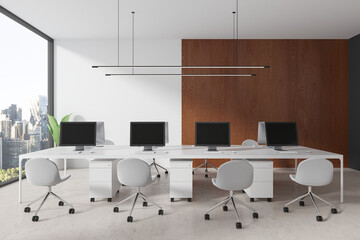 Wooden and white open space office with long table