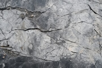 Grey Granite and concrete rock face texture background—cracked, rough surface with intricate grain, noise, and gradient details, capturing the raw, untamed essence of natural textures