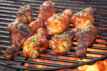 Roasted chicken leg marinated with honey and spices. © shaiith