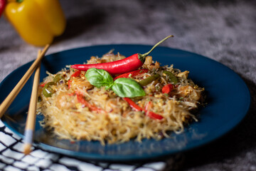 Asian salad with glass noodles, chicken, prawn, shrimp and vegetables