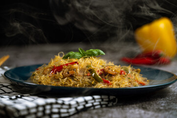 Smoky Asian salad with glass noodles, chicken, prawn, shrimp and vegetables