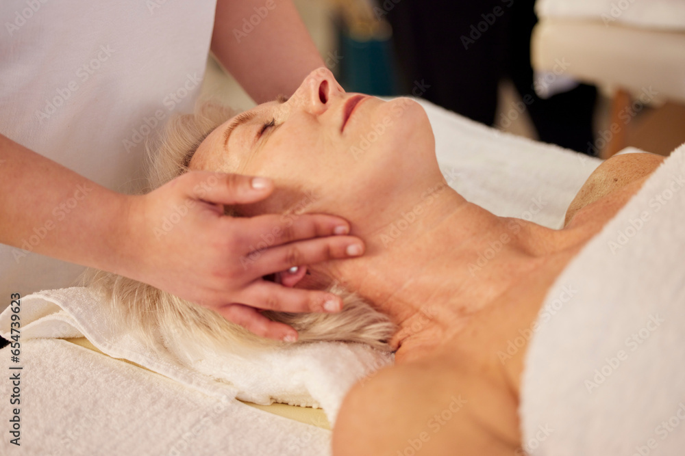 Sticker Relax, face massage and senior woman at a spa for health, wellness and anti aging skincare treatment. Calm, beauty and elderly female person in retirement with wrinkles face routine at natural salon.