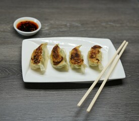 Dumplings with chopsticks