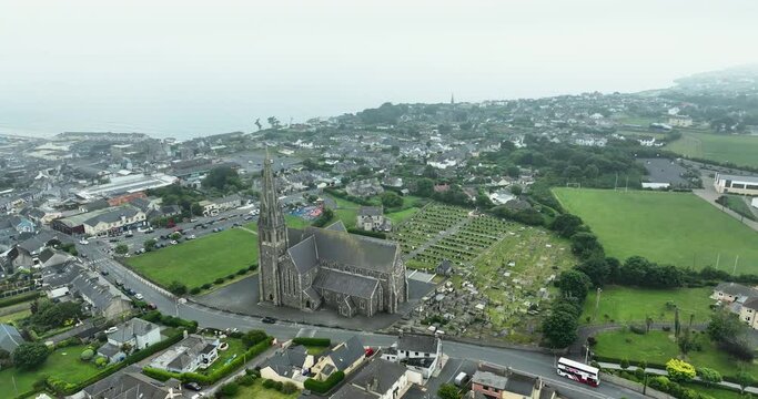 Flying over Catholic Church which overlooks the entire coastal town of Tramore