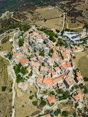 Aerial view of scenic Pietralta village in Corsica, France - 654747655