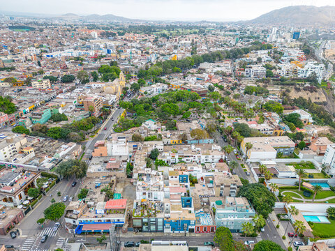 Aerial view of the Barranco neighborhood in Lima, Peru in 2023. Spanish colonial style historic buildings. Neighborhood with new houses and also many houses degraded by time. Gastronomic region