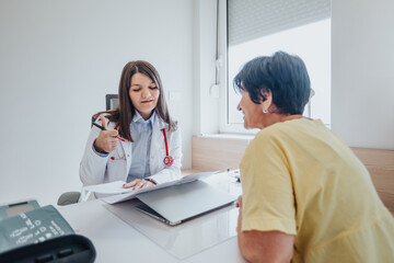 A conversation between professional psychiatrist and senior patient analyzing results for successful treatment and diagnosis.