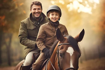 Foto op Plexiglas Portrait of father and son riding horses together in early morning © AspctStyle