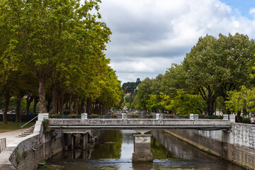 Leiria, Portugal, August 29, 2021: View of Lis River in the city of Leiria, Portugal. Leiria is a city and a municipality in the Center Region of Portugal. Bridge over River Lis and Polis Via. © An Instant of  Time