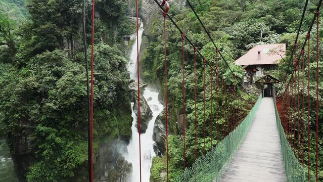 spectacular waterfall of El Pailon del Diablo close to Banos Santa Agua in the andes mountains of Ecuador, South America.