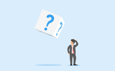Concept of hesitation. doubt in investment. uncertainty. a confused businessman looking at a dice with a question mark. investment risk that is always haunted by uncertainty. finding the answers.