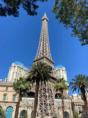 Fotobehang Las Vegas, Nevada, USA, June 25, 2022: The Eiffel Tower Restaurant and Paris Las Vegas Hotel and Casino at Las Vegas Strip. © An Instant of Time